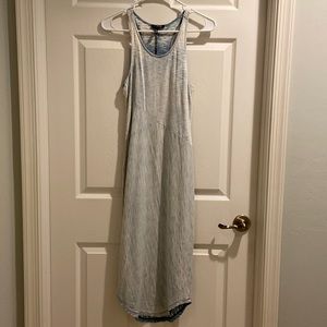 Kind Of lightweight denim dress.Racer back, rounded hem,Small,body-conscious!